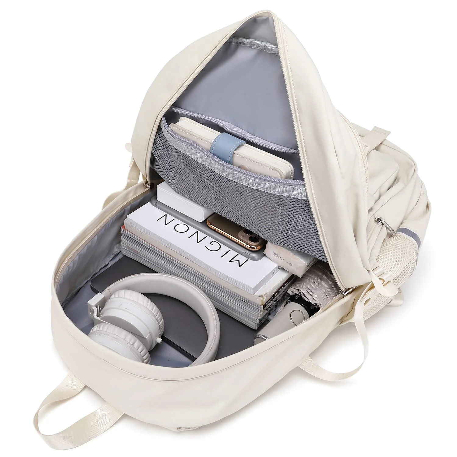 A school bookbag open: the laptop sleeve sits against the back panel, where the heaviest thing belongs